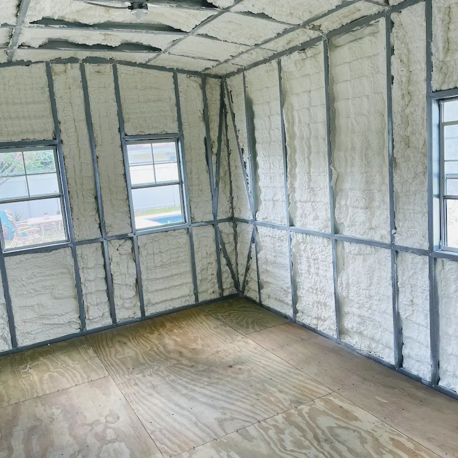Closed-cell spray foam insulation applied to wall cavities in a residential project in Cave Spring